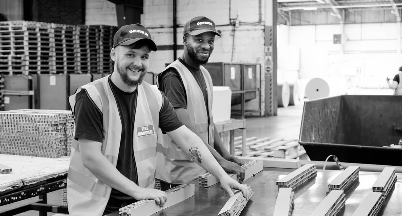 Dufaylite workers with void fill production line